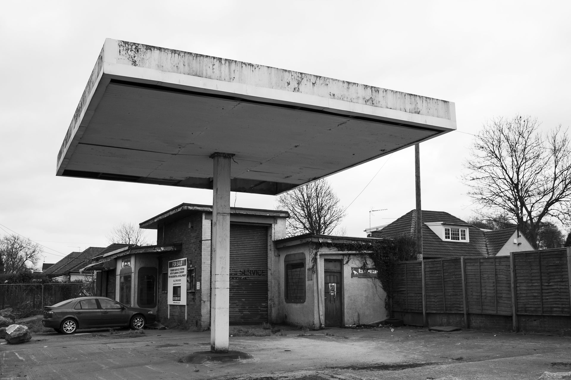 Busy petrol station forecourt during peak demand