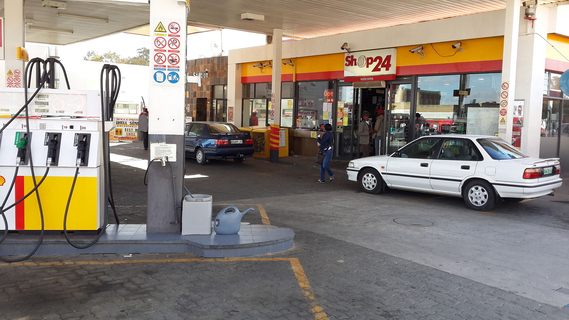 POS terminal validating a voucher at a petrol station